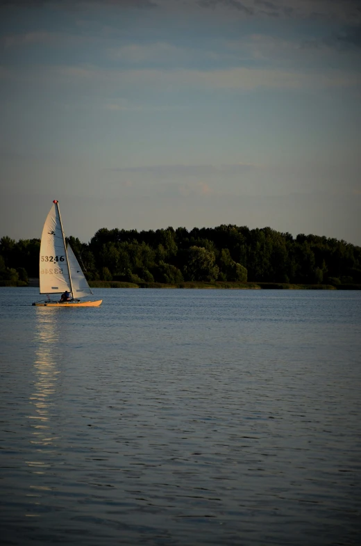 a sailboat that is out in the ocean