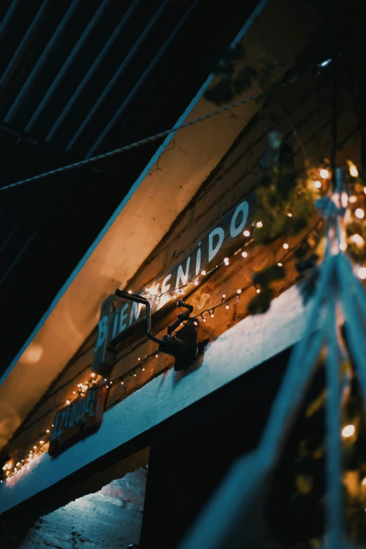 an old po shows a bar sign, and lights