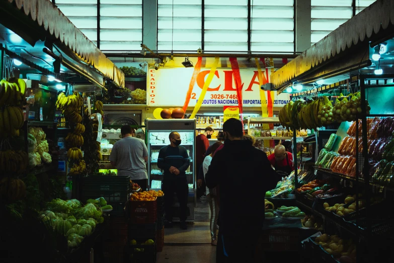 a grocery store filled with lots of fresh fruit and vegetables
