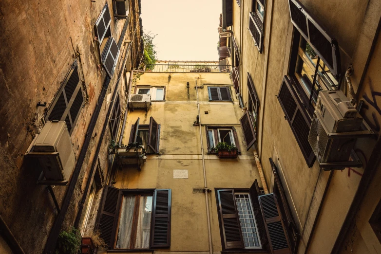 there is an apartment with several balconies that are attached to the walls