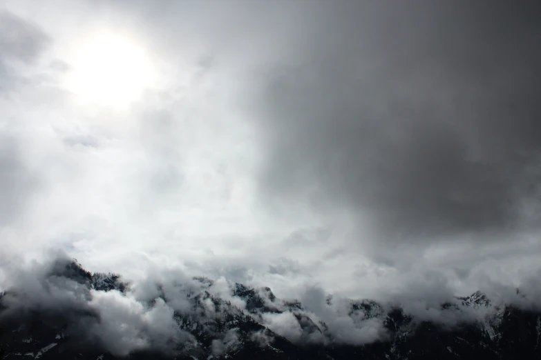 the view of an airplane in flight through storm clouds