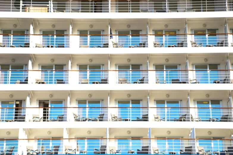 there is a tall building with balconies and balconies on each floor