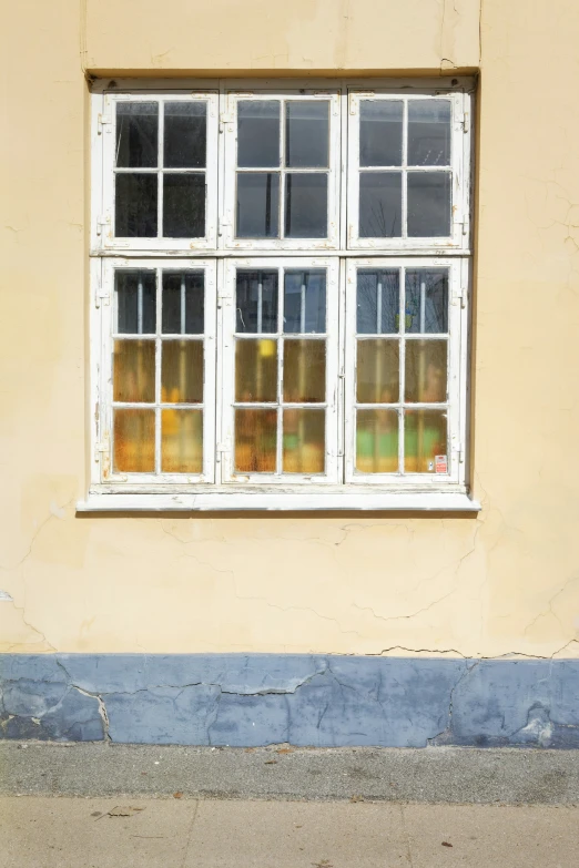 a window showing light and shadows that are in it