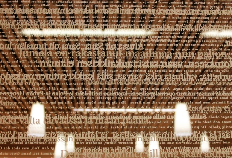 a wall with words that are in the shape of a picture