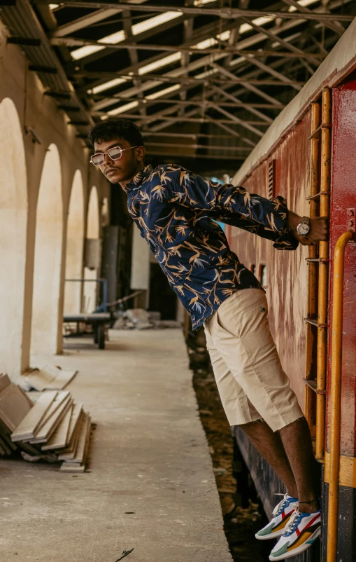 a person is leaning against the side of the train