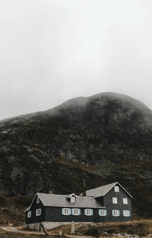 a mountain side house that is by itself