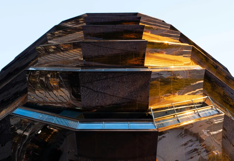 an unusual roof made out of glass is seen