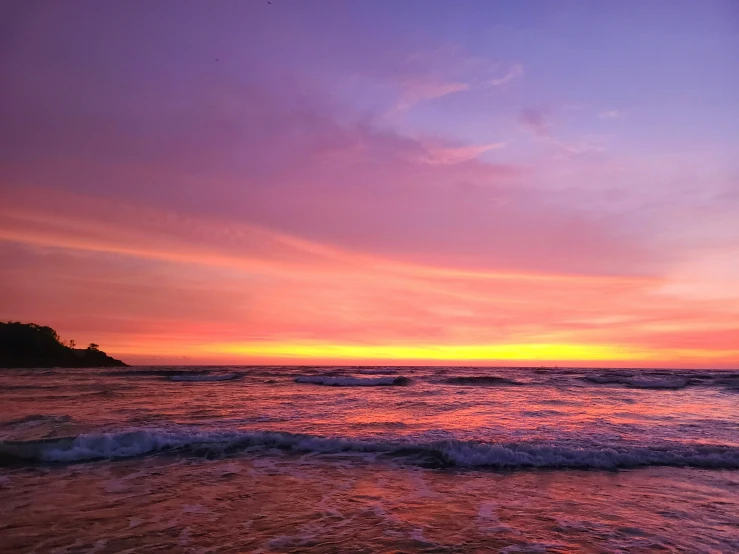 a colorful sunset with blue and pink clouds