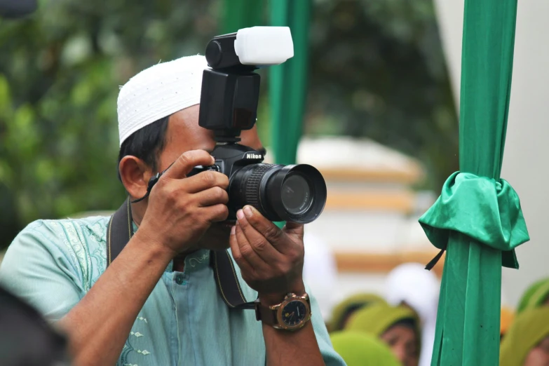 a pographer takes a pograph of an event