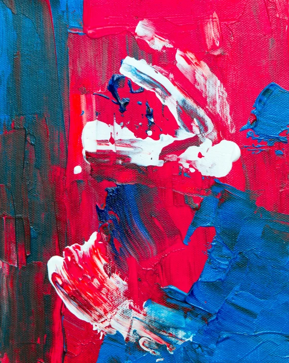 blue and red abstract painting on canvas with a person