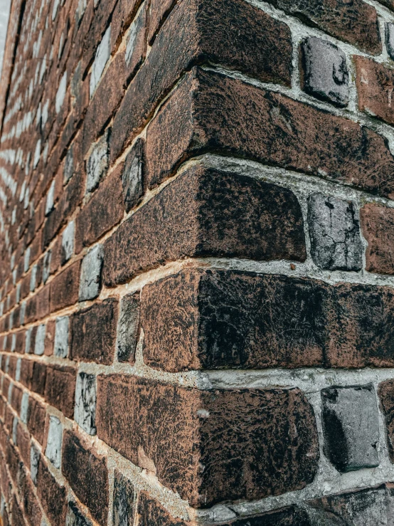 the side of an old brick wall