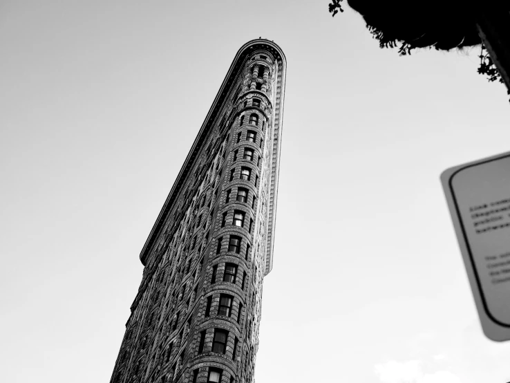 an old clock tower towering over the city