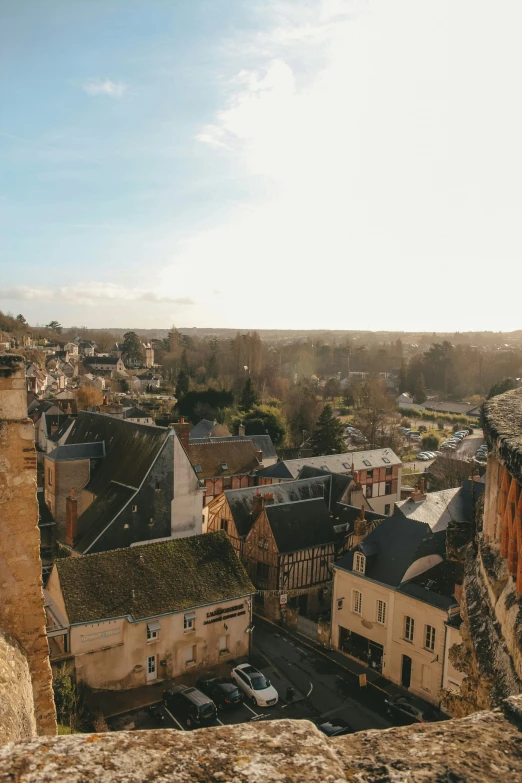 a view over a city that has a clock on it