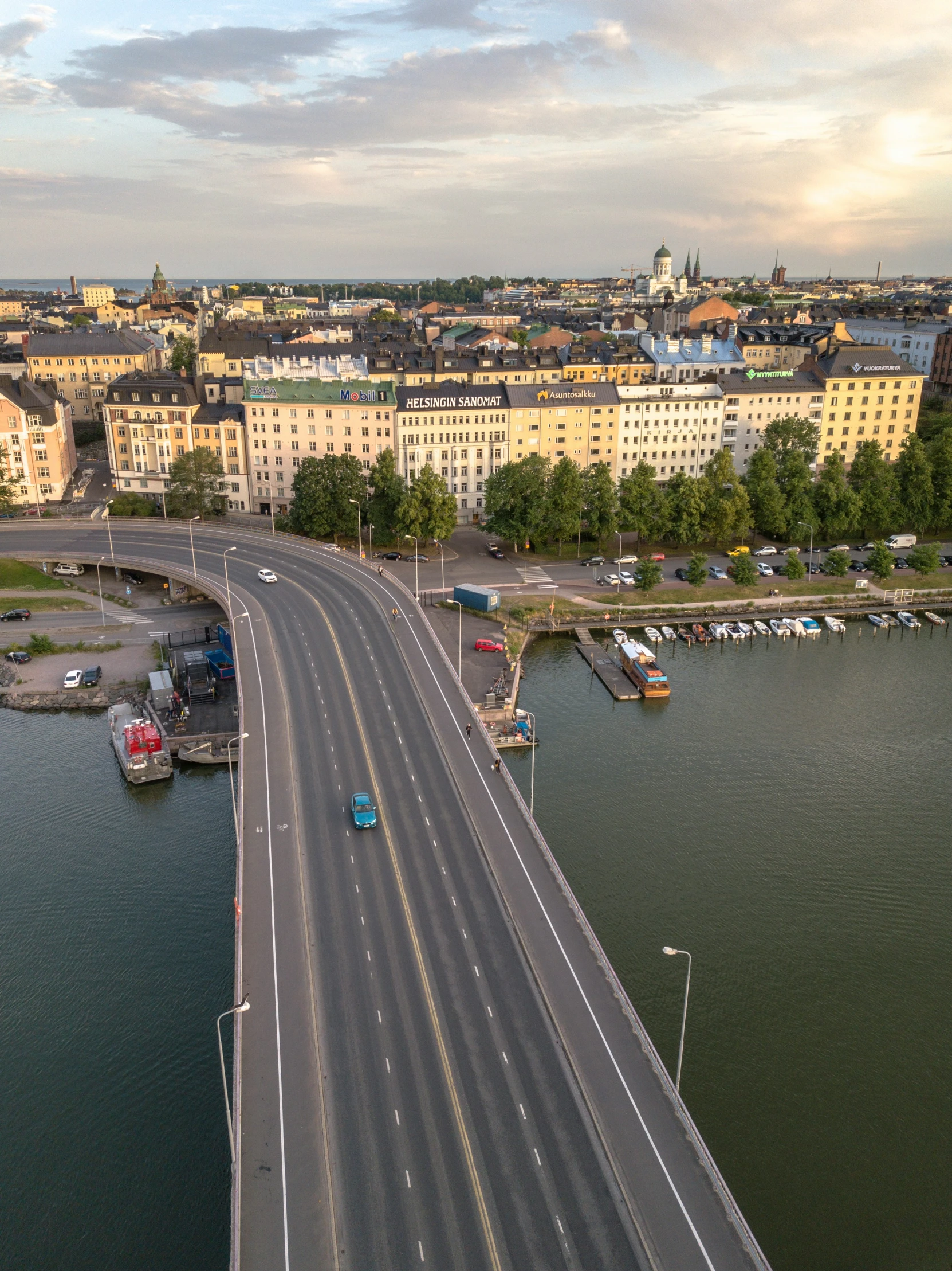 an aerial view of a highway bridge over a large river