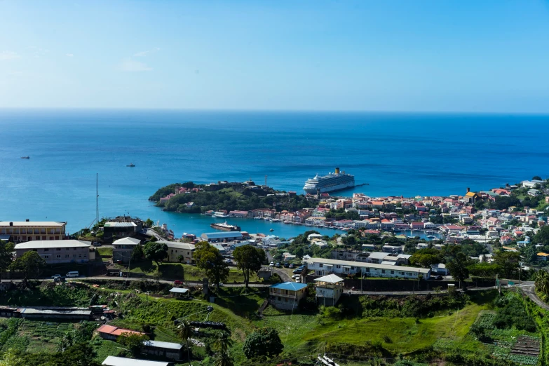 an aerial view of a seaside town in the middle of a bay