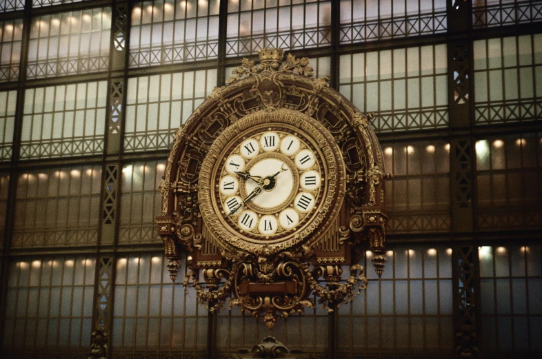 a clock hanging off the side of a building