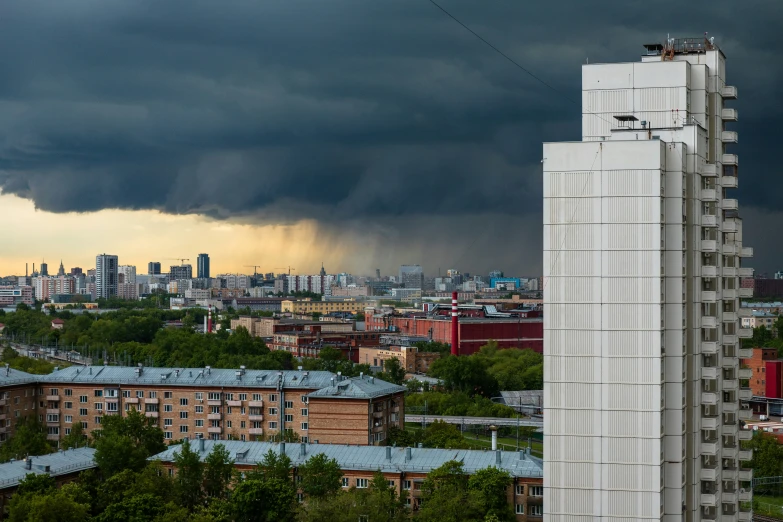 the sky is getting dark in an urban setting