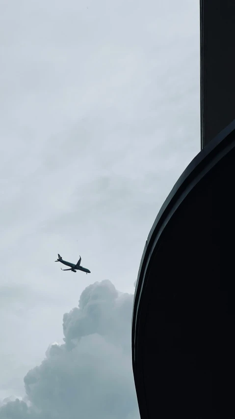 an airplane is flying high up in the sky