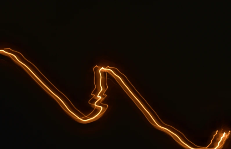 some light painting in the dark with some water and a bird