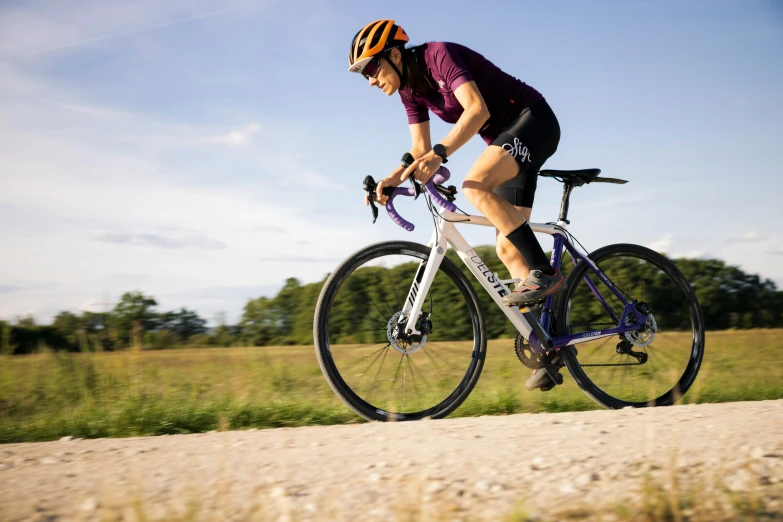 a person riding on a bike on the road