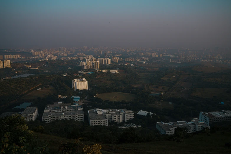 a view of a city and some hills