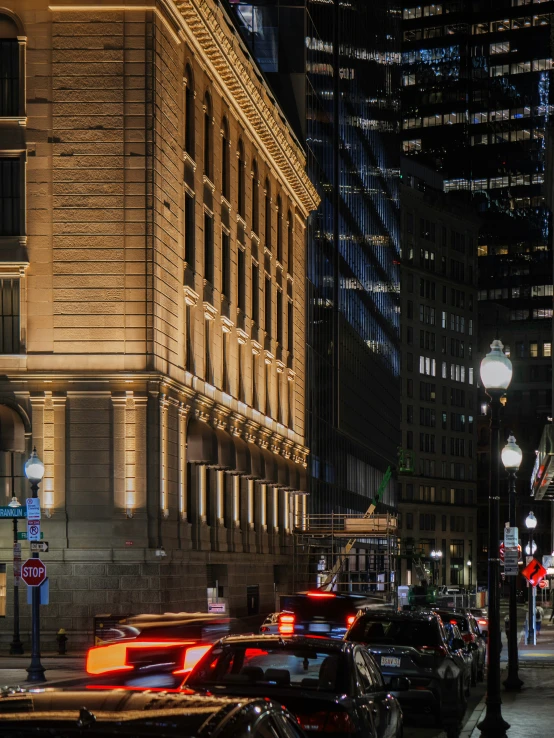 there is a busy city street in the night