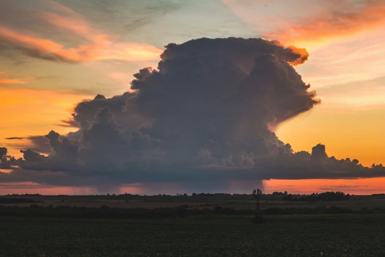 a cloud formation is seen as the sun sets