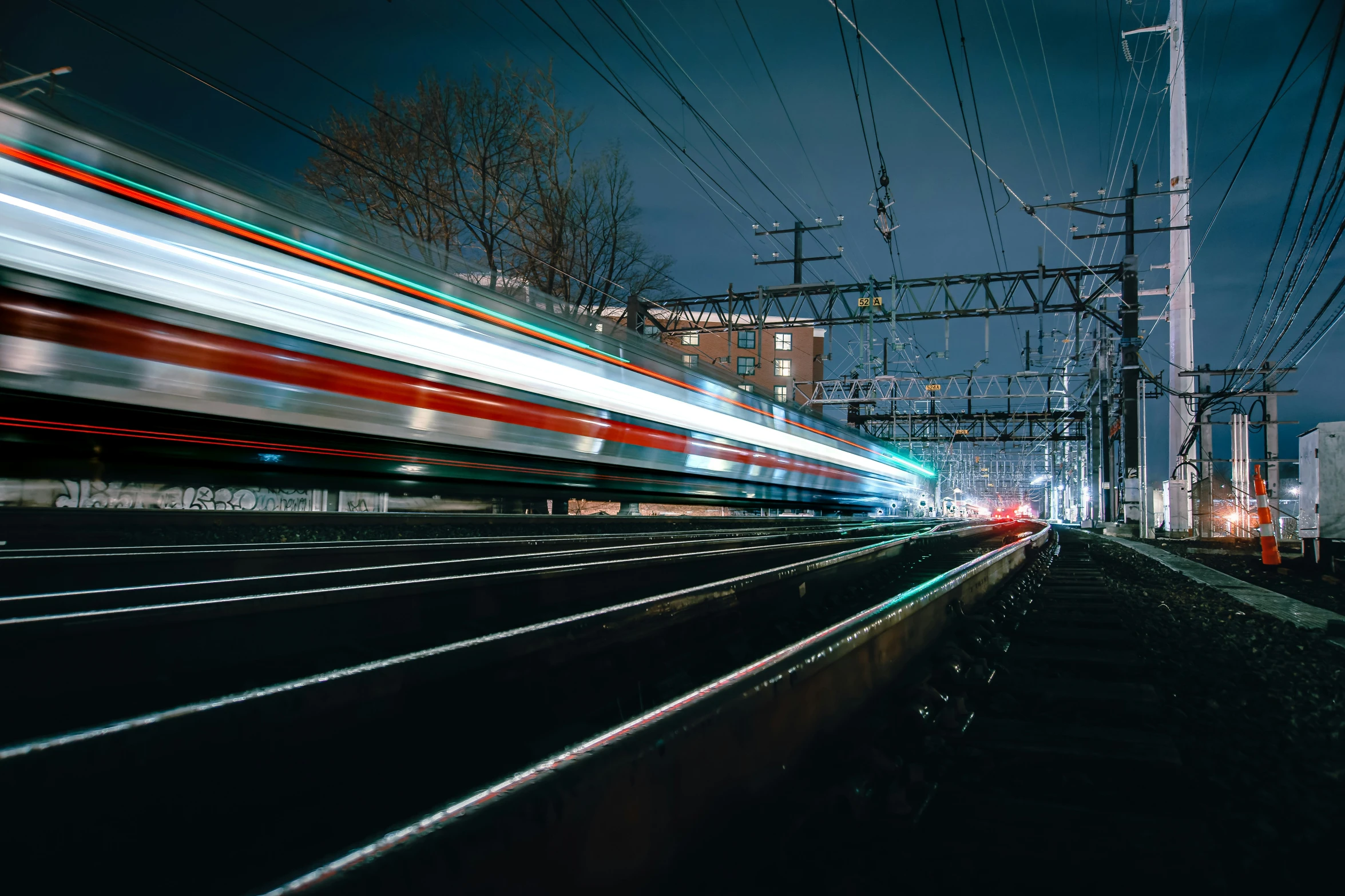 a train is speeding down the train track