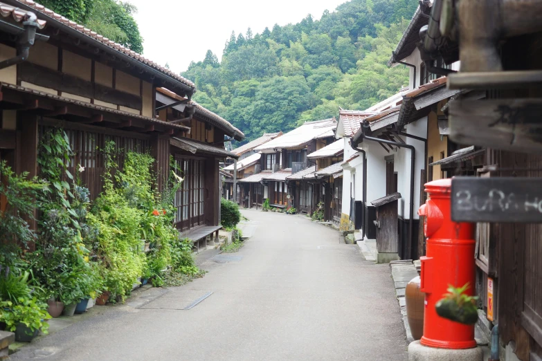 narrow town area with buildings on both sides