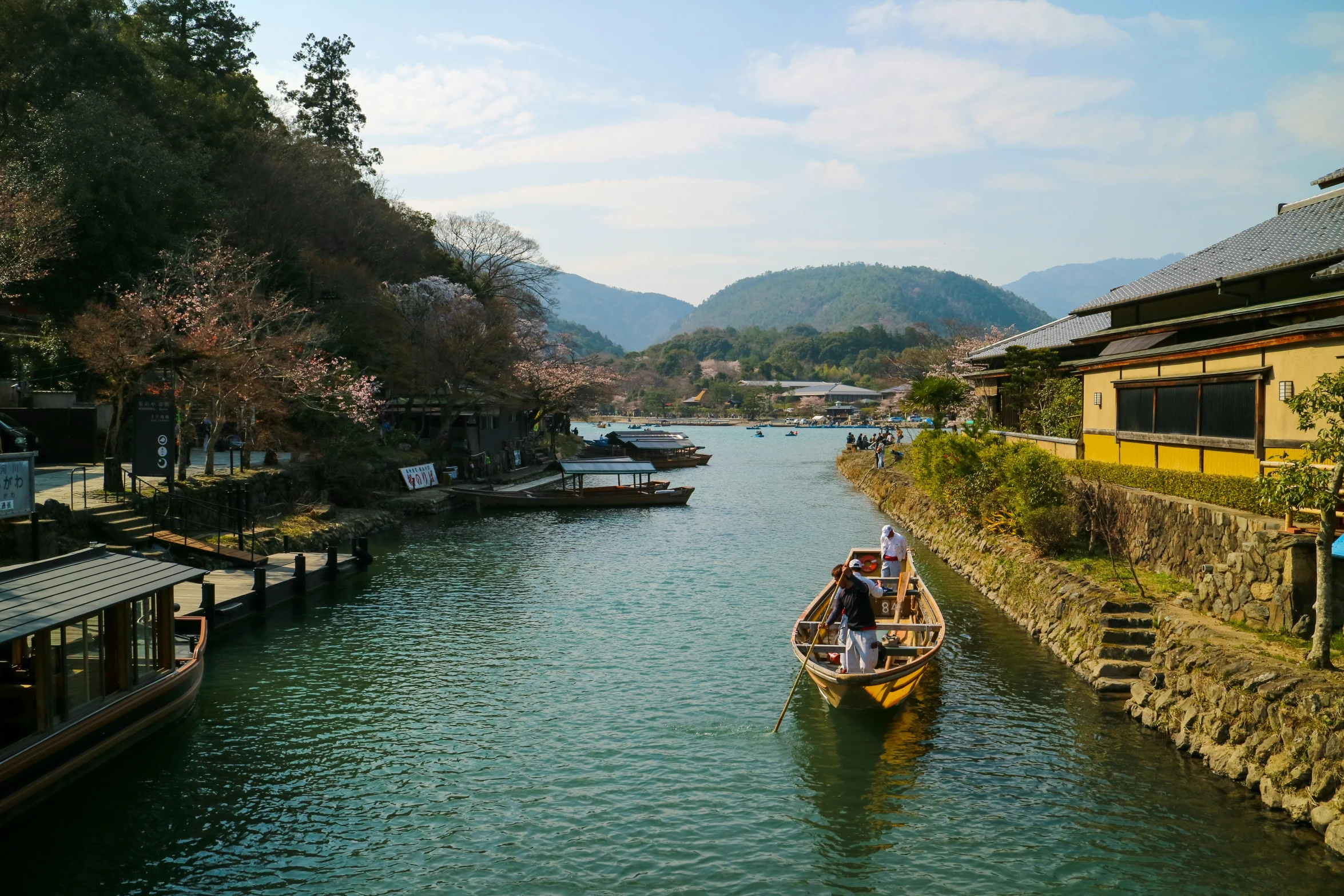 a man is in a boat on a river