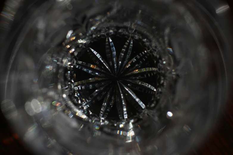 an abstract po looking down into the center of a glass object