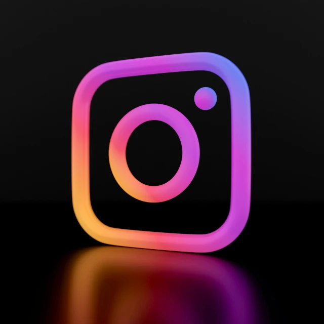 the icon for instagram shows a bright rainbow colored instagram