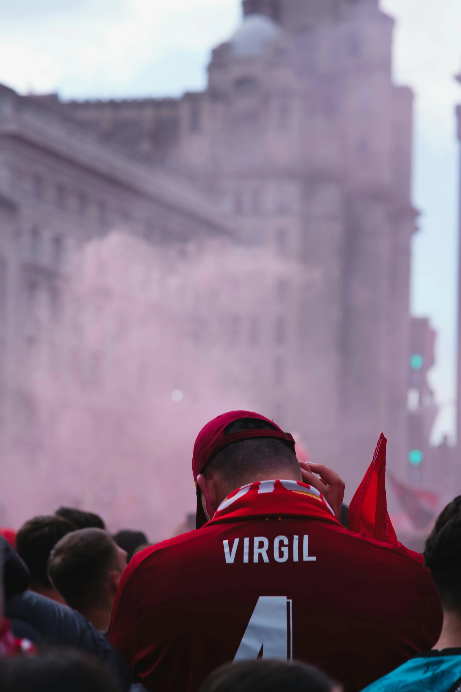 a couple of people are wearing red shirts