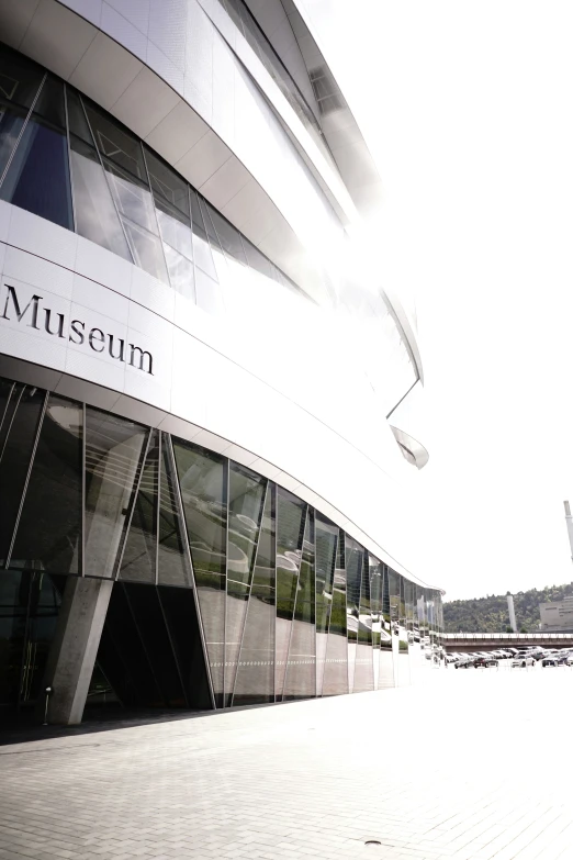 a building with some water in it and the words museum written on it