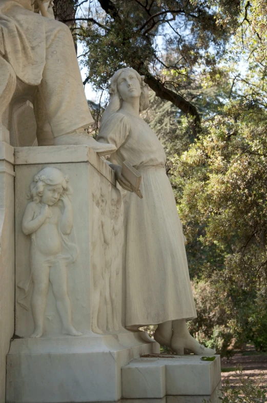 a statue with a statue on one of it's sides