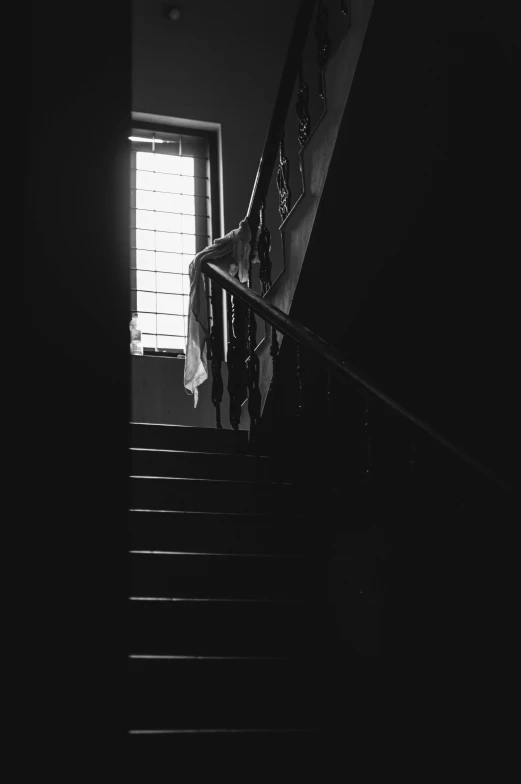 this is a stairs leading to the light coming from inside