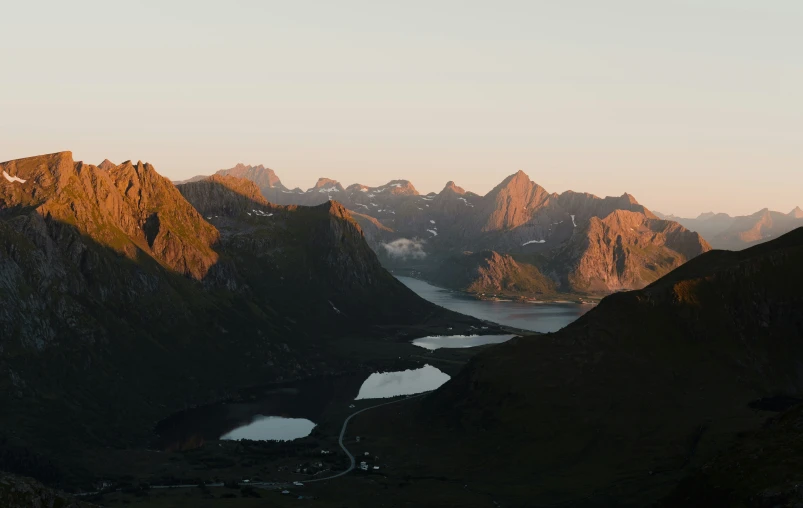 an image of sunset lights on the mountains