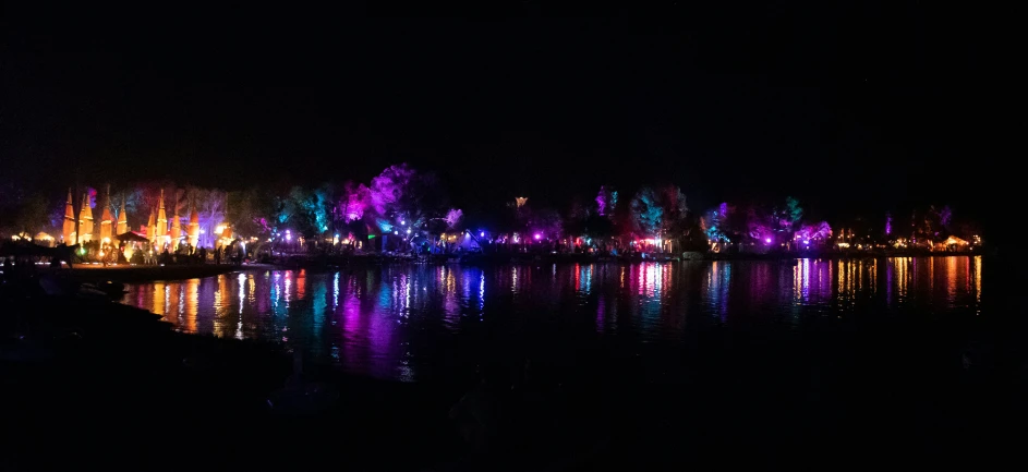 lights reflected in the water of a lake