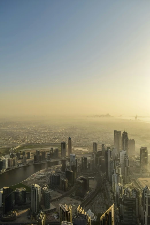 a po taken from a tall building that overlooks a river