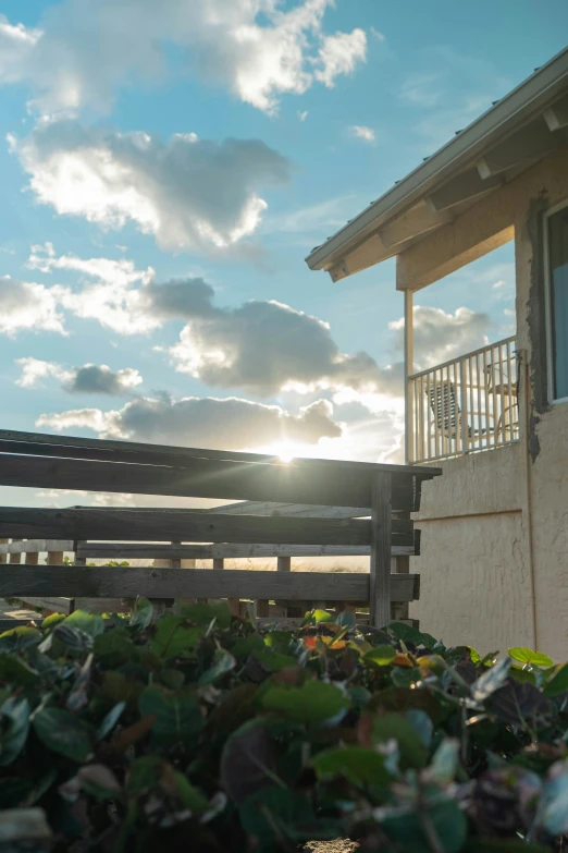 a window in front of a window sill with a view to the beach