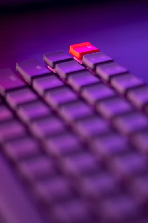 a red keyboard with purple keys that read red