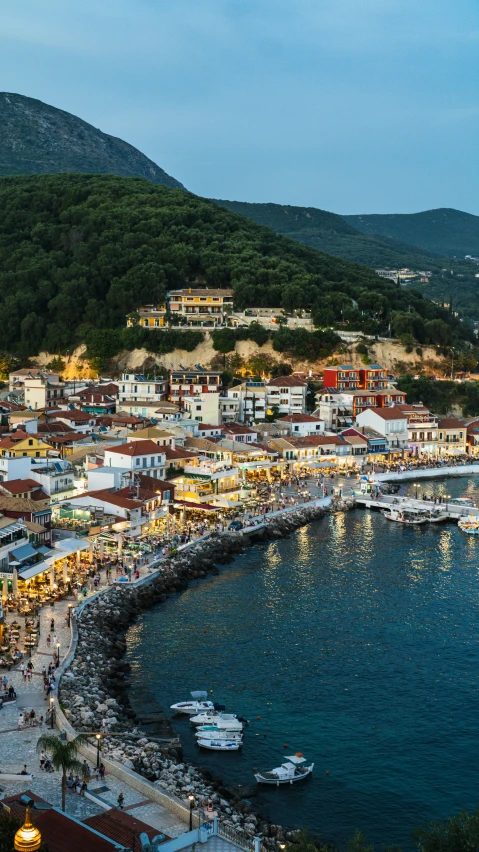 an aerial view of a city next to the ocean