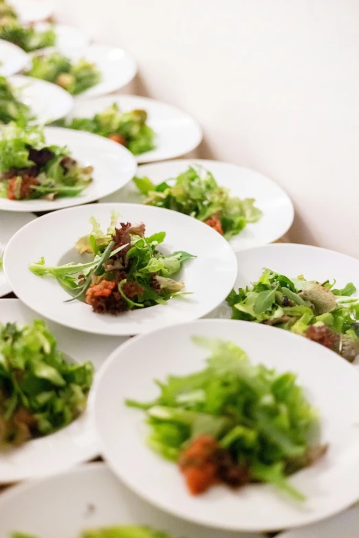 a table with several plates of food on them