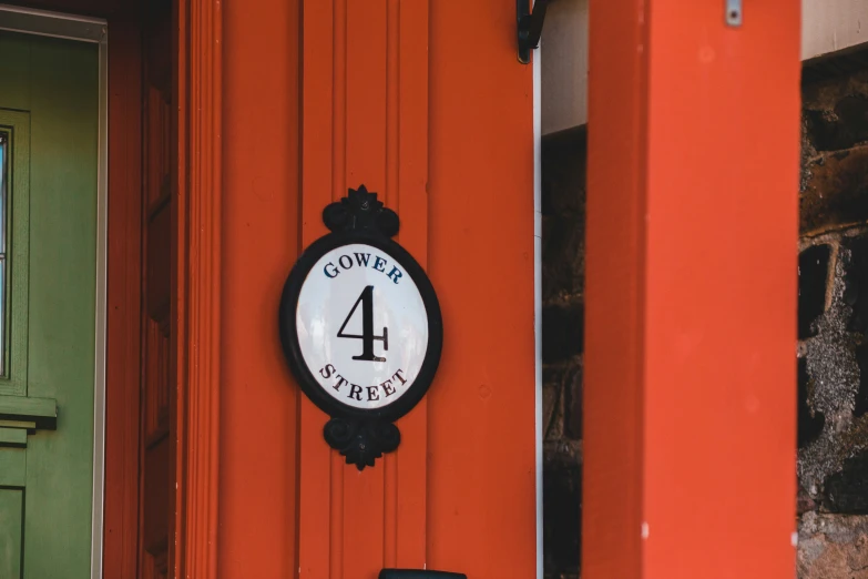 there is a four cents sign mounted to the door