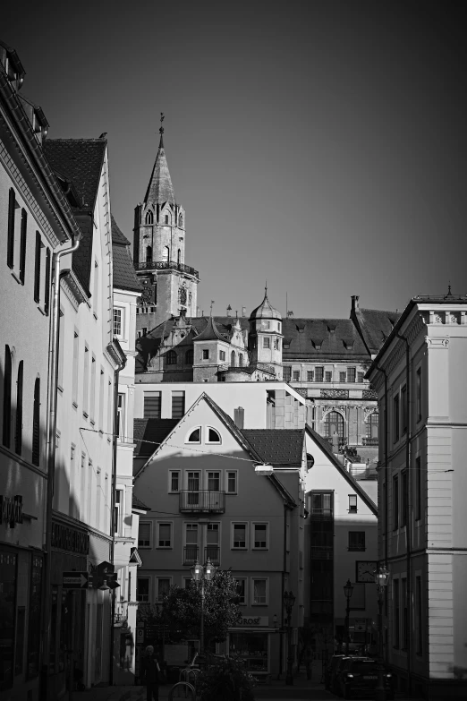 the city is lined with old buildings and has an enormous steeple