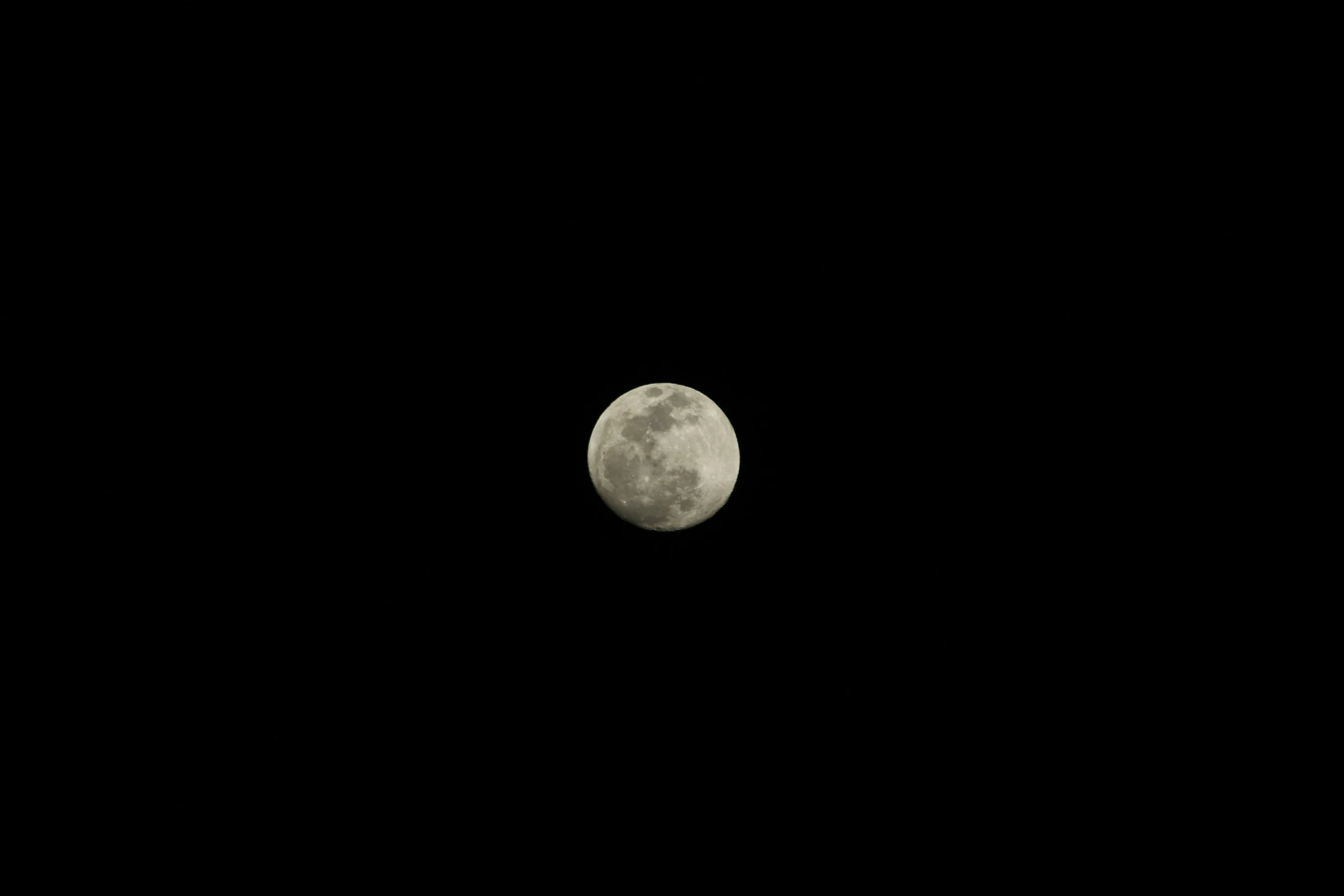 a very large moon is shown in the sky