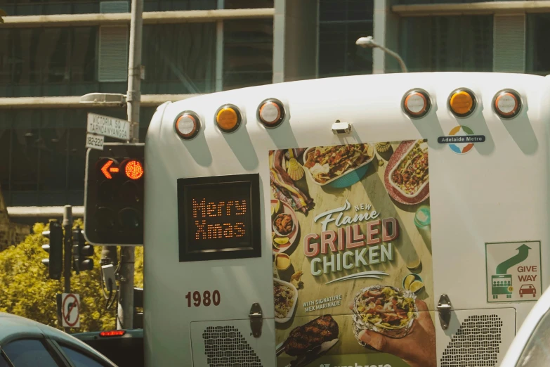 a very large food truck advertising soing delicious