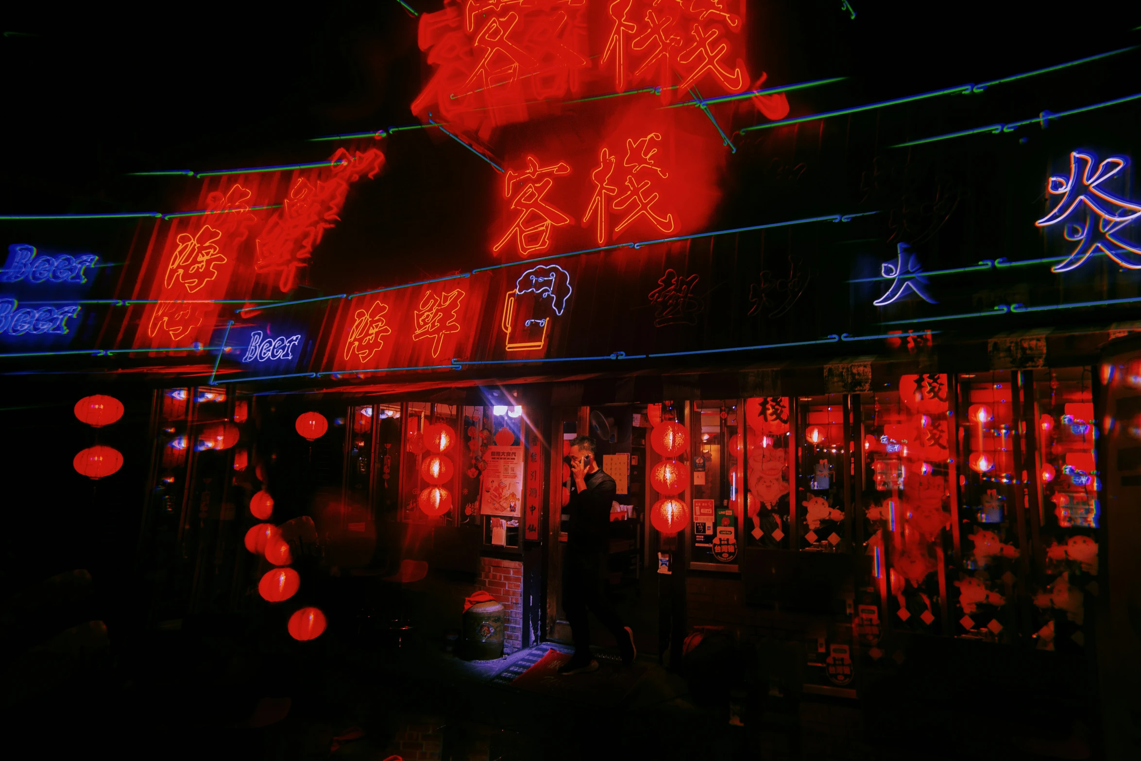 an oriental styled building decorated with red and blue decorations