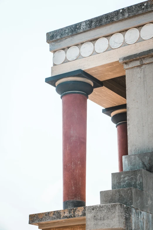 a column that is in the middle of some stone