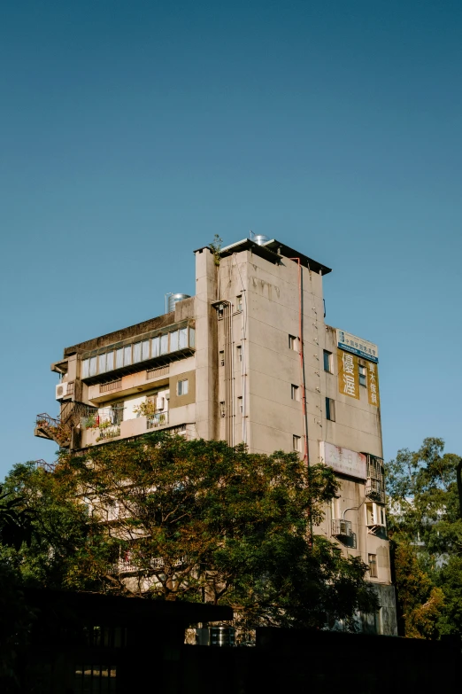 a large building that has lots of windows and balconies